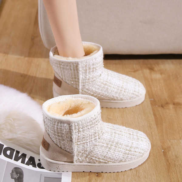 Ženske čizme od tekstila i tople postave