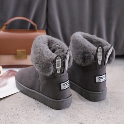 Ženske čizme s toplom postavom i 3D elementima