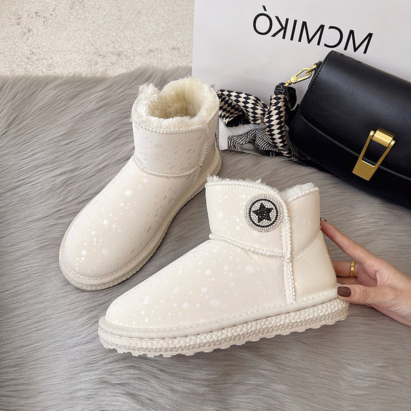 Ženske čizme s toplom postavom i grbom