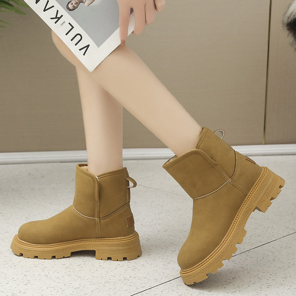 Moderne kožne čizme s toplom postavom