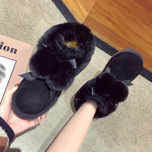 Ženske čizme s perom i ravnim potplatom