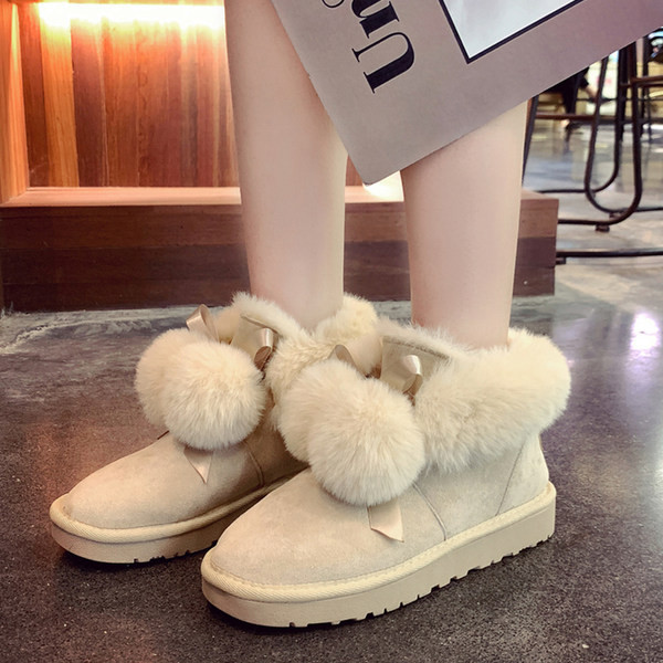 Ženske čizme s perom i ravnim potplatom