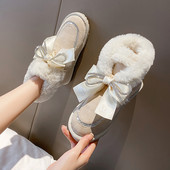 Ženske zimske čizme s trakom i puhom