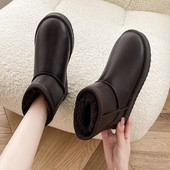 Ženske kožne čizme s toplom postavom