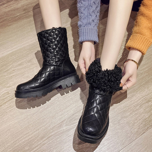 Ženske čizme s toplom postavom u crno-bijeloj boji