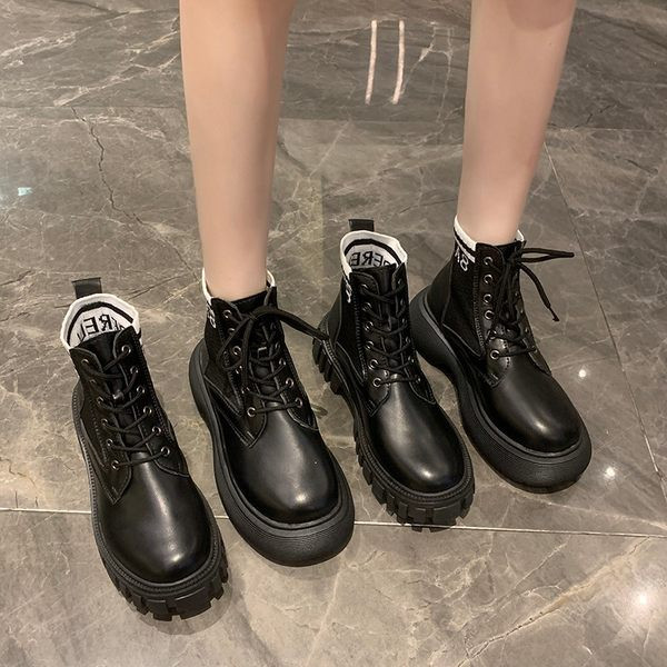 Ležerne kožne čizme s vezicama i natpisom