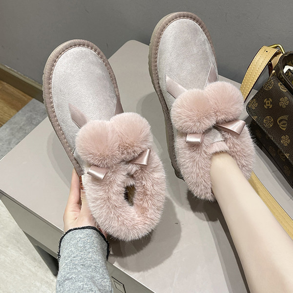 Ženske moderne čizme s perom i trakom