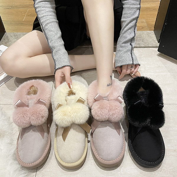 Ženske moderne čizme s perom i trakom