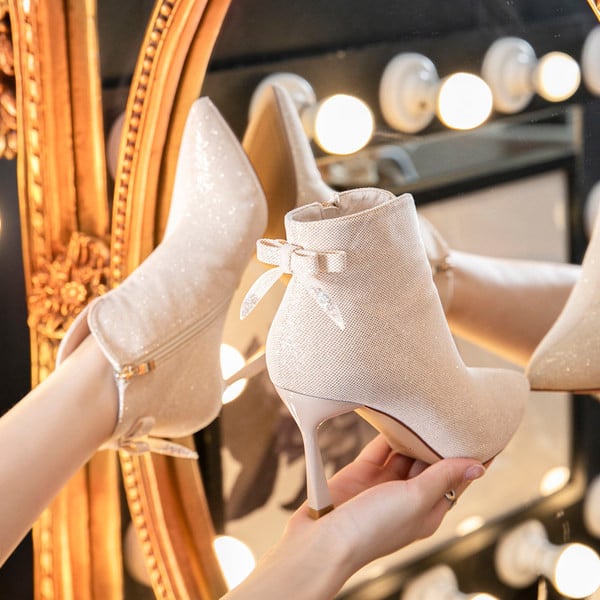 Ženske čizme na špic s patentnim zatvaračem i petom 7 cm