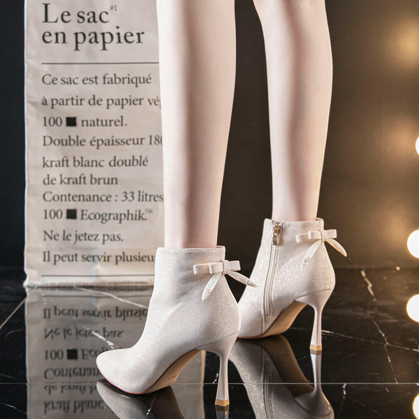 Ženske čizme na špic s patentnim zatvaračem i petom 7 cm