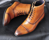 Muške čizme s ravnim potplatom, kopčanjem na patentni zatvarač i vezicama