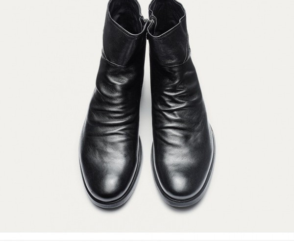 Meeste ümmargused tikandiga kunstnahast saapad