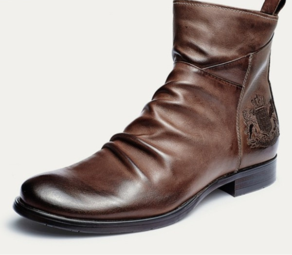 Meeste ümmargused tikandiga kunstnahast saapad