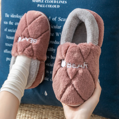 Current women`s slippers with embroidery