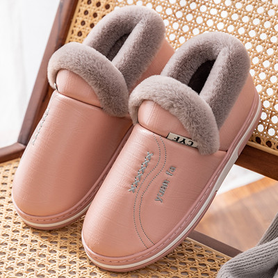 Women`s leather slippers with embroidery and warm lining