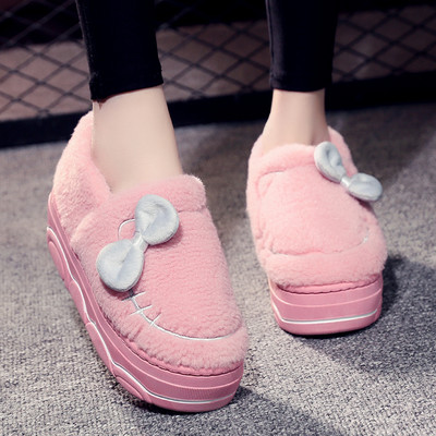 Women`s slippers with high soles and ribbon