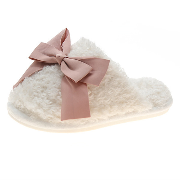 Дамски пухени чехли д цветна панделка