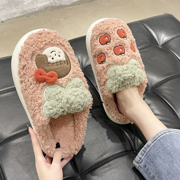 Ženske papuče s trakom i aplikacijom