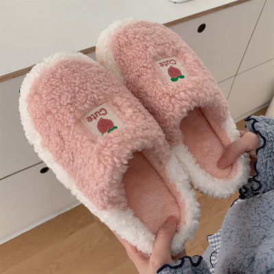 Women`s slippers with embroidered inscription