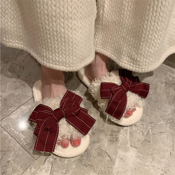 Ženske papuče s trakom i ravnim potplatom