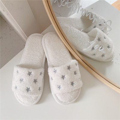 Women`s down slippers with embroidered stars
