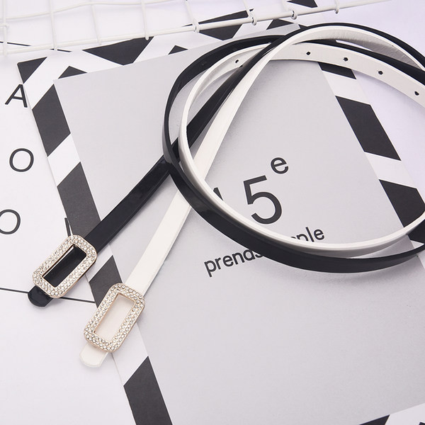 Női alkalmi bőr öv fém díszítéssel