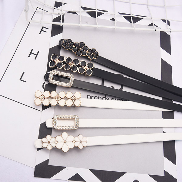 Női alkalmi bőr öv fém díszítéssel