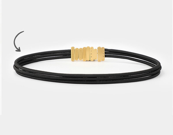 Elegáns fekete karcsú női öv fém csattal