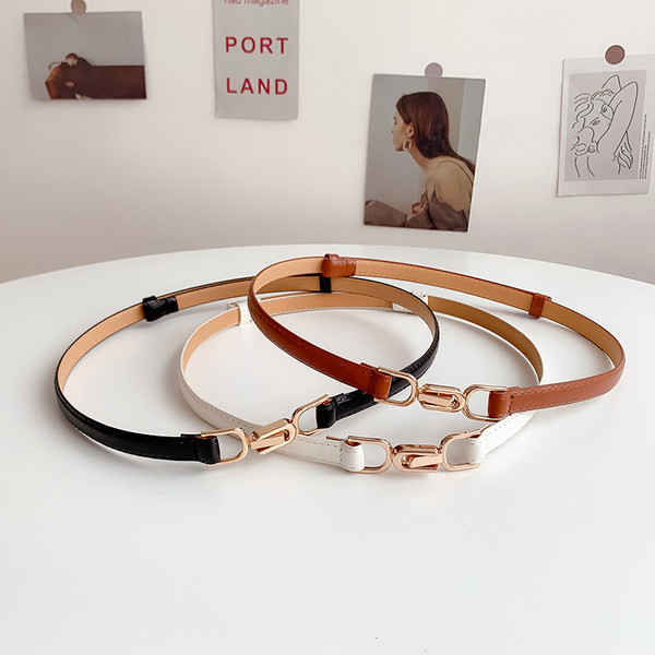 Stílusos bőr karcsú öv csattal