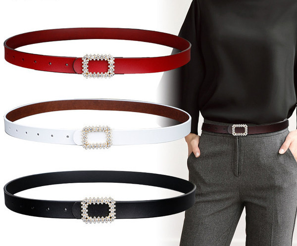 Vékony női öv csattal és díszítő kövekkel