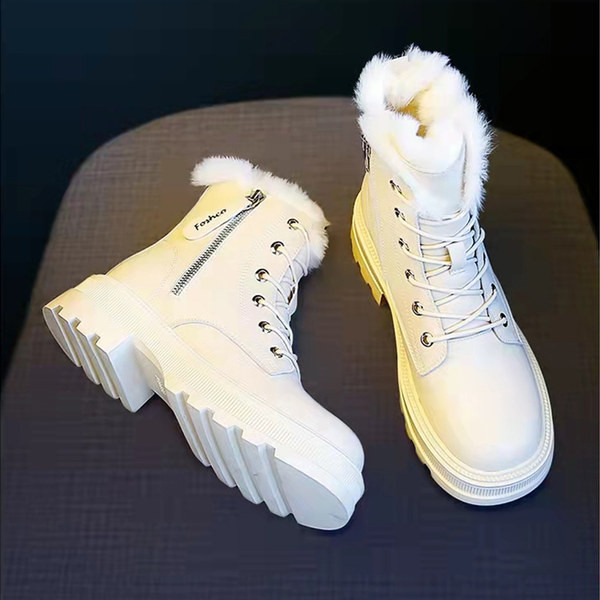 Meleg téli csizma durva talppal és cipzárral