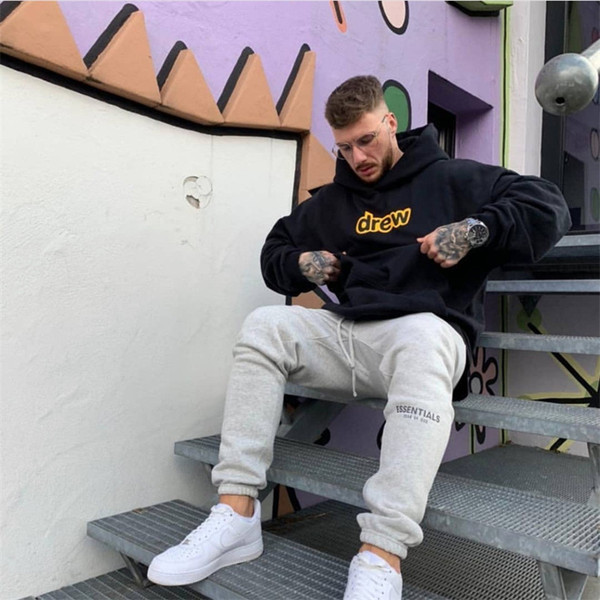 Férfi pulóver kapucnival és felirattal több színben