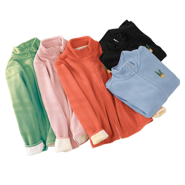 Női pulóver hímzéssel és cipzárral - különböző színekben