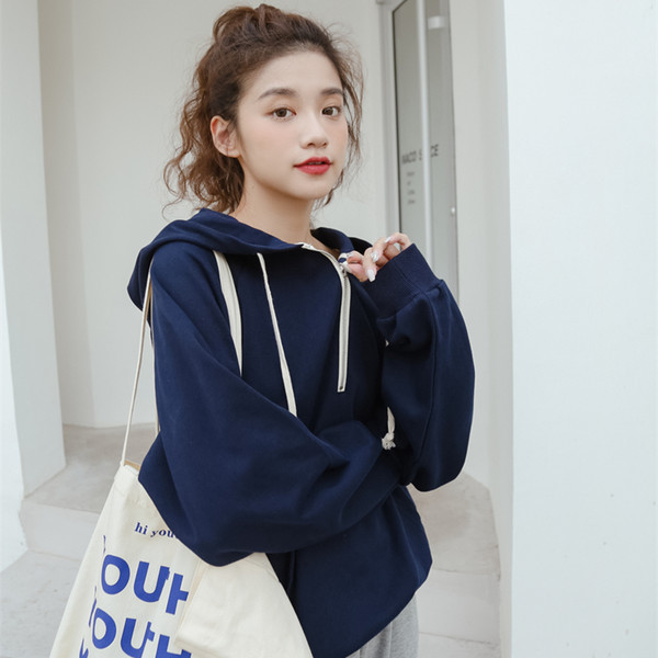 φαρδύ μοντέλο γυναικείο φούτερ με κουκούλα και κορδόνια