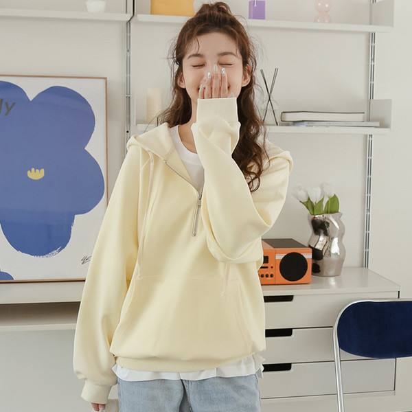 φαρδύ μοντέλο γυναικείο φούτερ με κουκούλα και κορδόνια