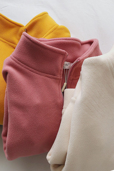 Női téli pulóver cipzárral és magas gallérral - négy színben