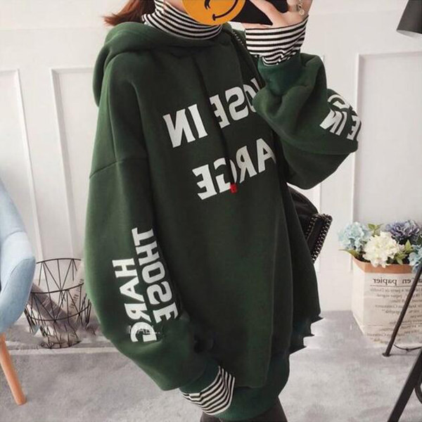 Női pulóver zöld és sárga feliratokkal