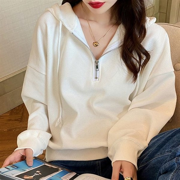 Női pulóver cipzárral és kapucnival több színben