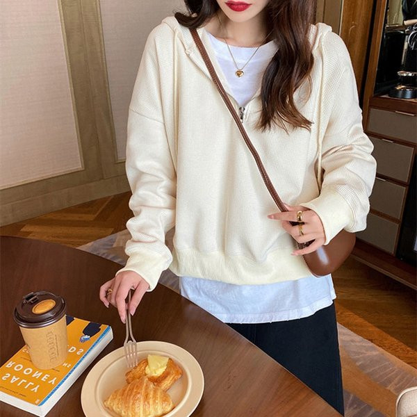 Női pulóver cipzárral és kapucnival több színben