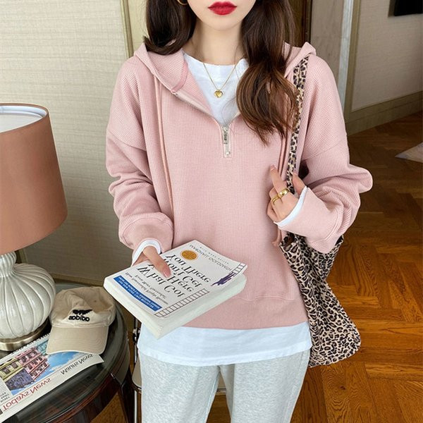 Női pulóver cipzárral és kapucnival több színben