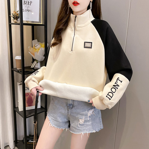 Női széles pulóver magas gallérral és cipzárral