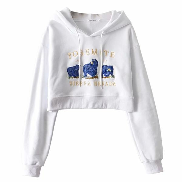 Új modell rövid női pulóver kapucnival és mintával