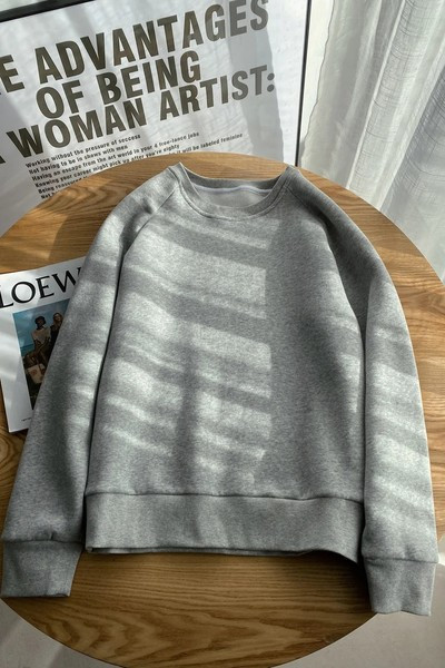 Női téli blúz ovális nyakkivágással