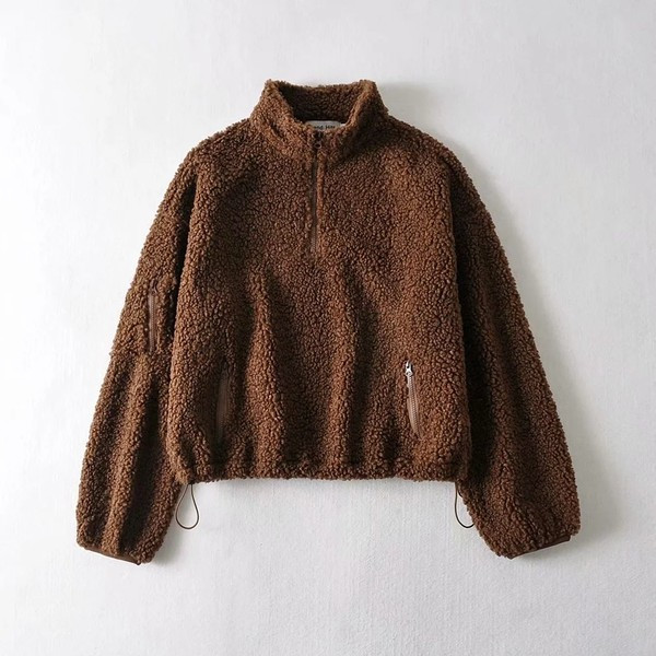 Női pehely pulóver magas gallérral és cipzárral