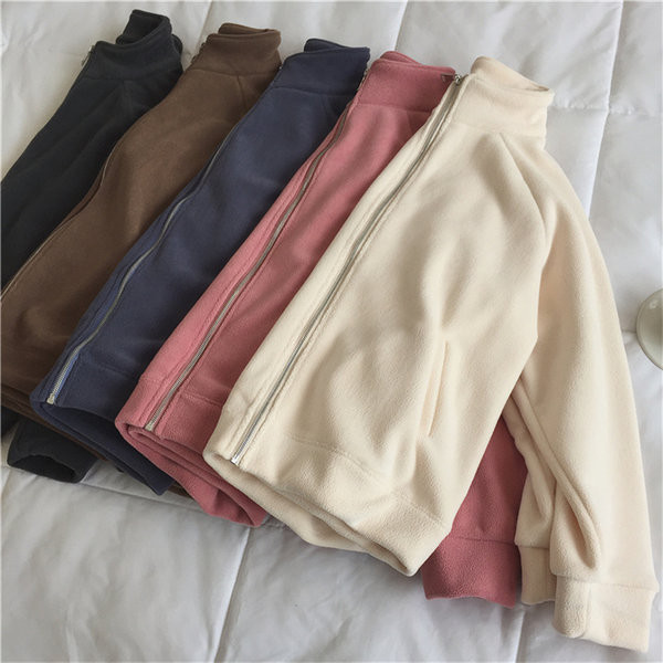 Φαρδύ μοντέλο πουπουλένιο με ψηλό γιακά και τσέπες