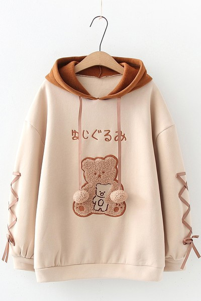 Női pulóver kapucnival és hímzéssel