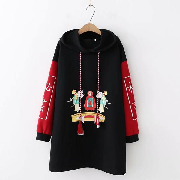 Női hosszú pulóver kapucnival és rátéttel