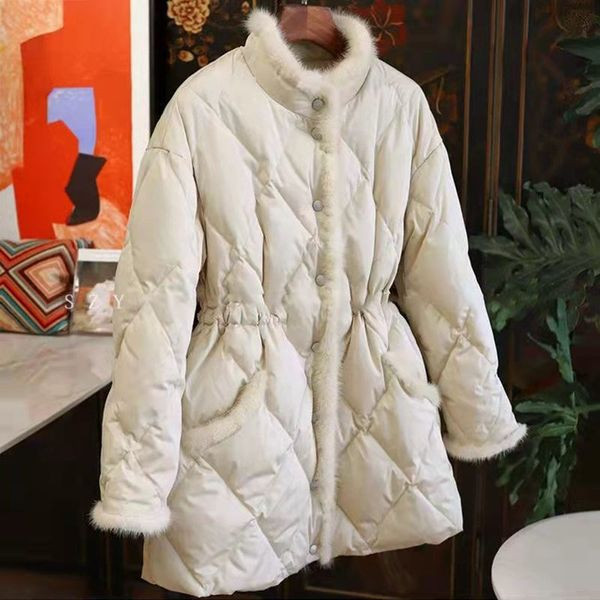 Női téli kabát pehely és gombokkal