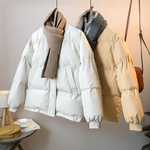 Női széles téli kabát zsebekkel