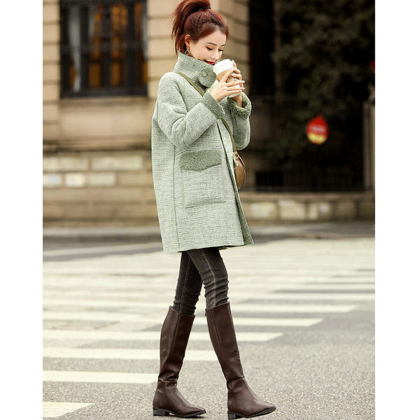 Női hosszú kabát magas gallérral